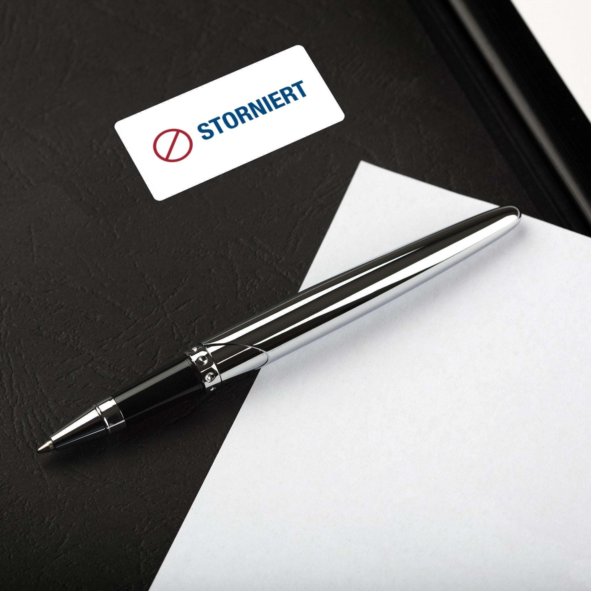 Aufkleber mit Piktogramm "Storniert" auf 60x30 mm Rollenetikett, 250 Stück, in deutscher Sprache, für Kennzeichnung.