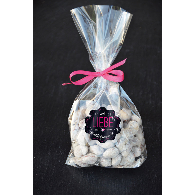 50 schwarze Aufkleber "Selbst gemacht" von Avery Zweckform auf Haushaltrolle, zum selbst gestalten und beschriften.